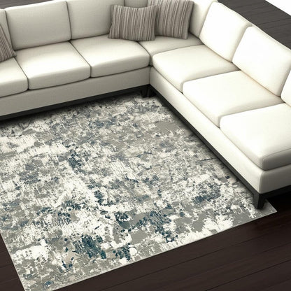 9' X 12' Blue and Beige Abstract Power Loom Area Rug