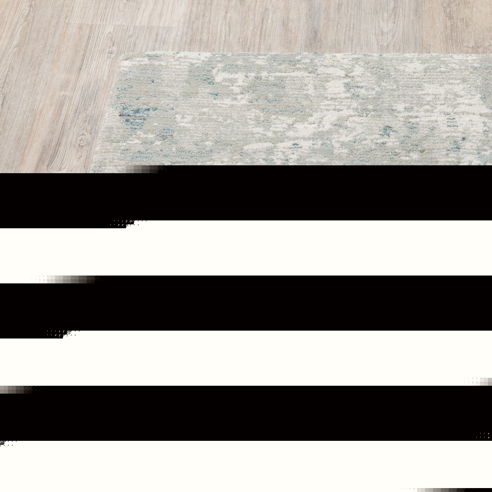 9' X 12' Blue and Beige Abstract Power Loom Area Rug
