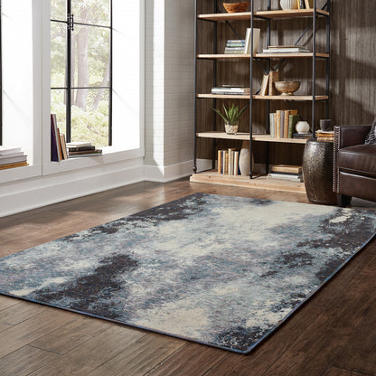 10' X 13' Blue and Ivory Abstract Power Loom Area Rug