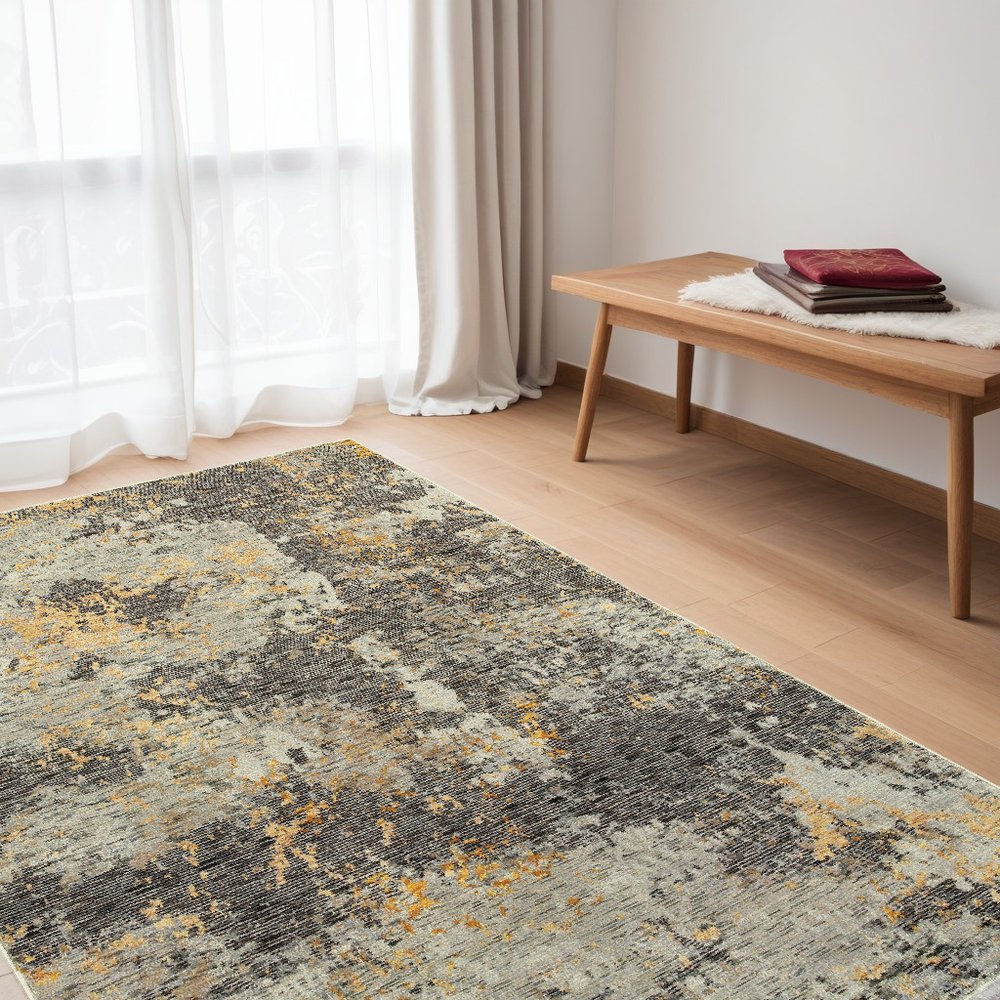 5' X 7' Gray and Ivory Abstract Power Loom Area Rug