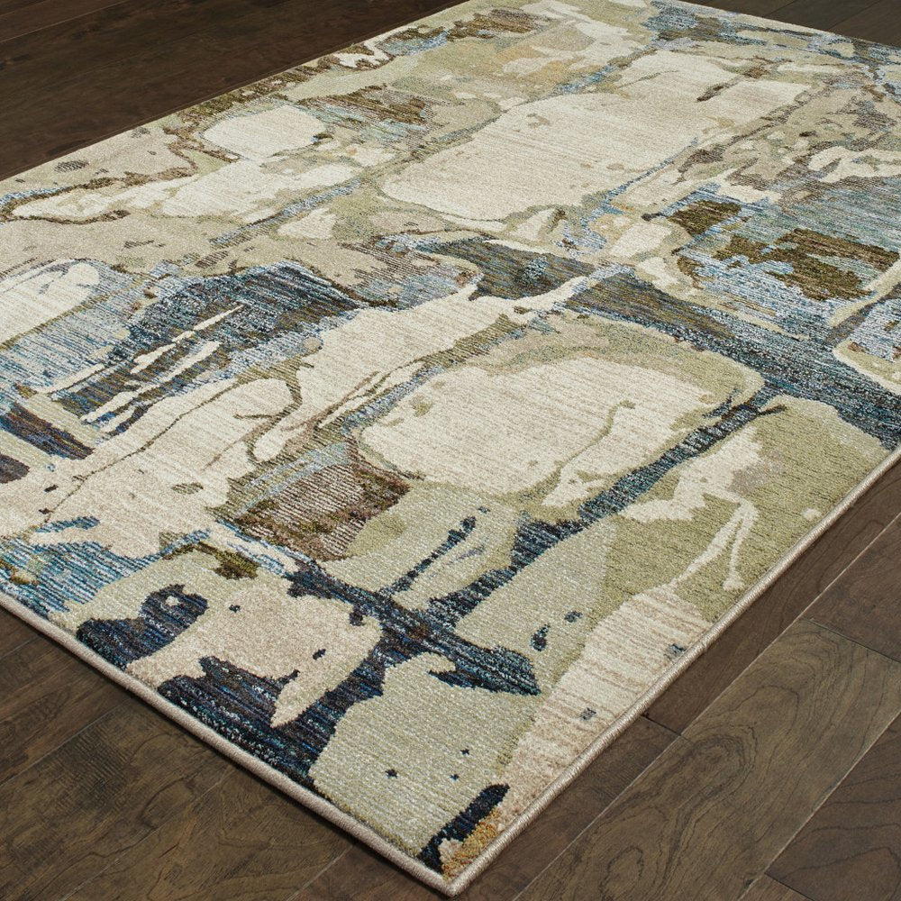 7' X 10' Blue and Gray Abstract Power Loom Area Rug