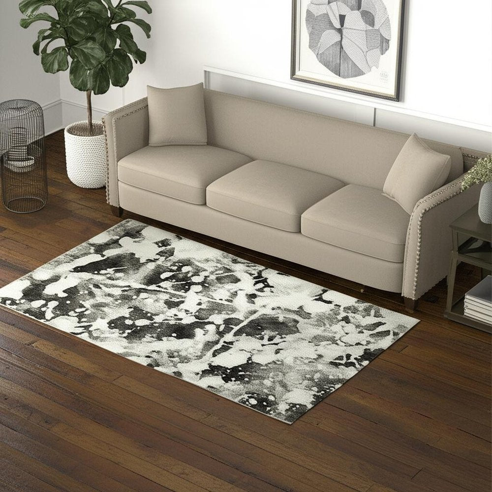 5' X 7' Gray and White Abstract Power Loom Area Rug