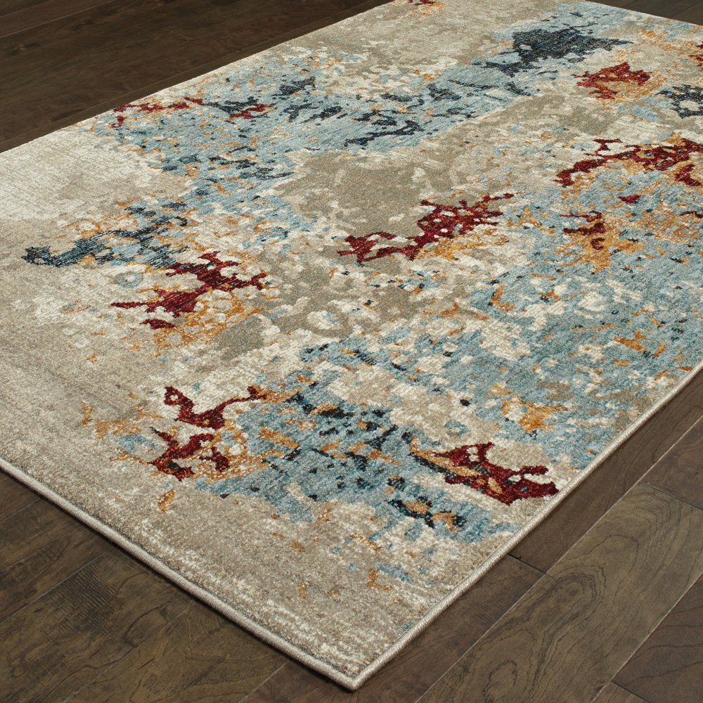 7' X 10' Blue and Beige Abstract Power Loom Area Rug