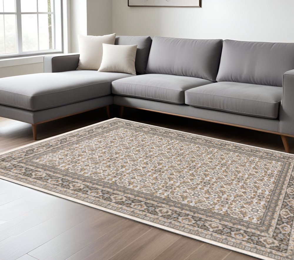 10' X 13' Ivory And Grey Oriental Power Loom Stain Resistant Area Rug With Fringe