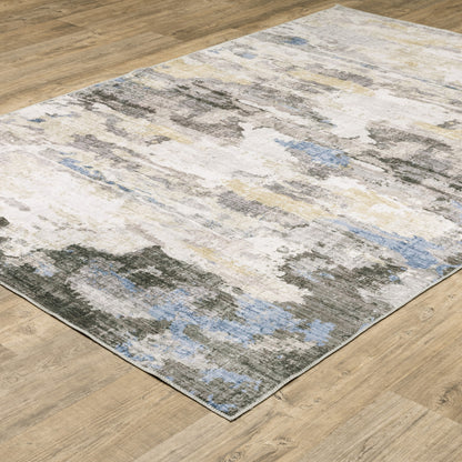 8' X 10' Grey Blue Charcoal Ivory Yellow Beige And Tan Abstract Printed Stain Resistant Non Skid Area Rug