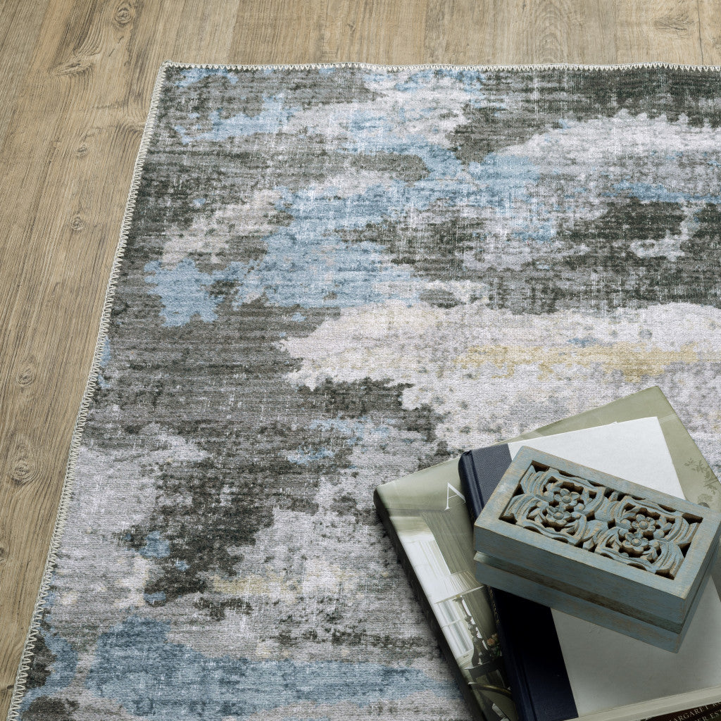 8' X 10' Grey Blue Charcoal Ivory Yellow Beige And Tan Abstract Printed Stain Resistant Non Skid Area Rug