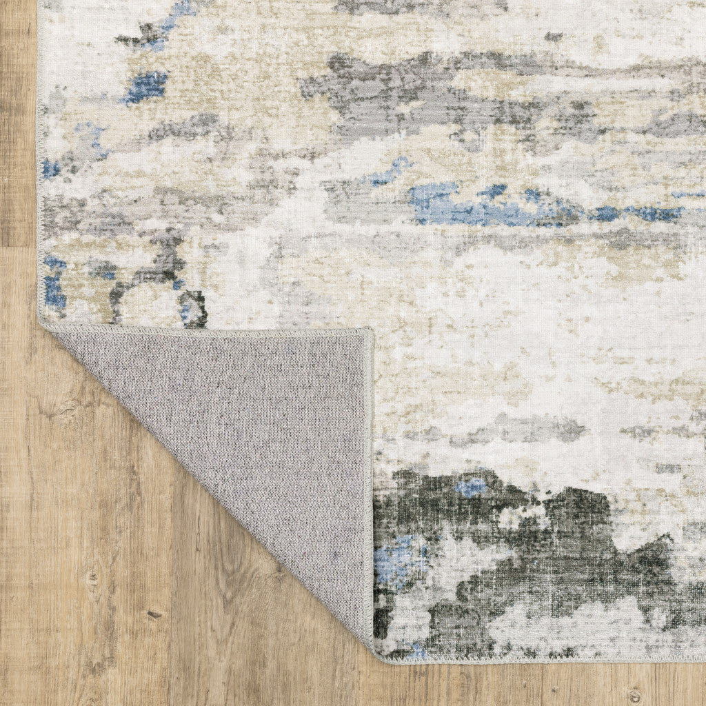 8' X 10' Grey Blue Charcoal Ivory Yellow Beige And Tan Abstract Printed Stain Resistant Non Skid Area Rug