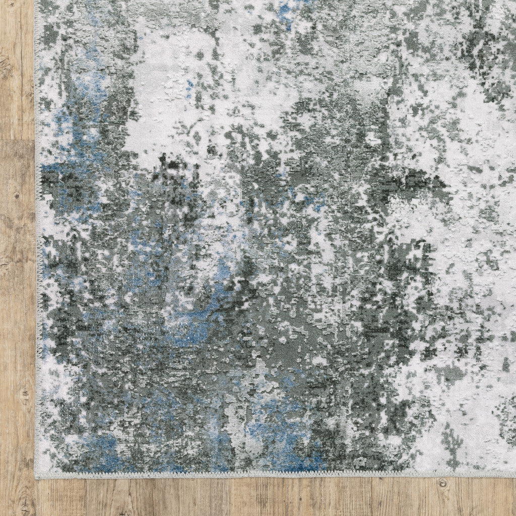 5' X 7' Silver Grey Charcoal And Light Blue Abstract Printed Stain Resistant Non Skid Area Rug