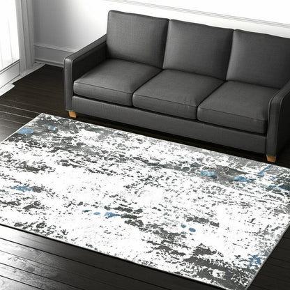 5' X 7' Silver Grey Charcoal And Light Blue Abstract Printed Stain Resistant Non Skid Area Rug