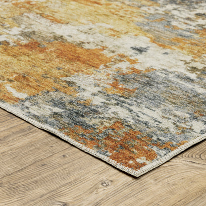 2' X 3' Teal Blue Orange Gold Grey Tan Brown And Beige Abstract Printed Stain Resistant Non Skid Area Rug