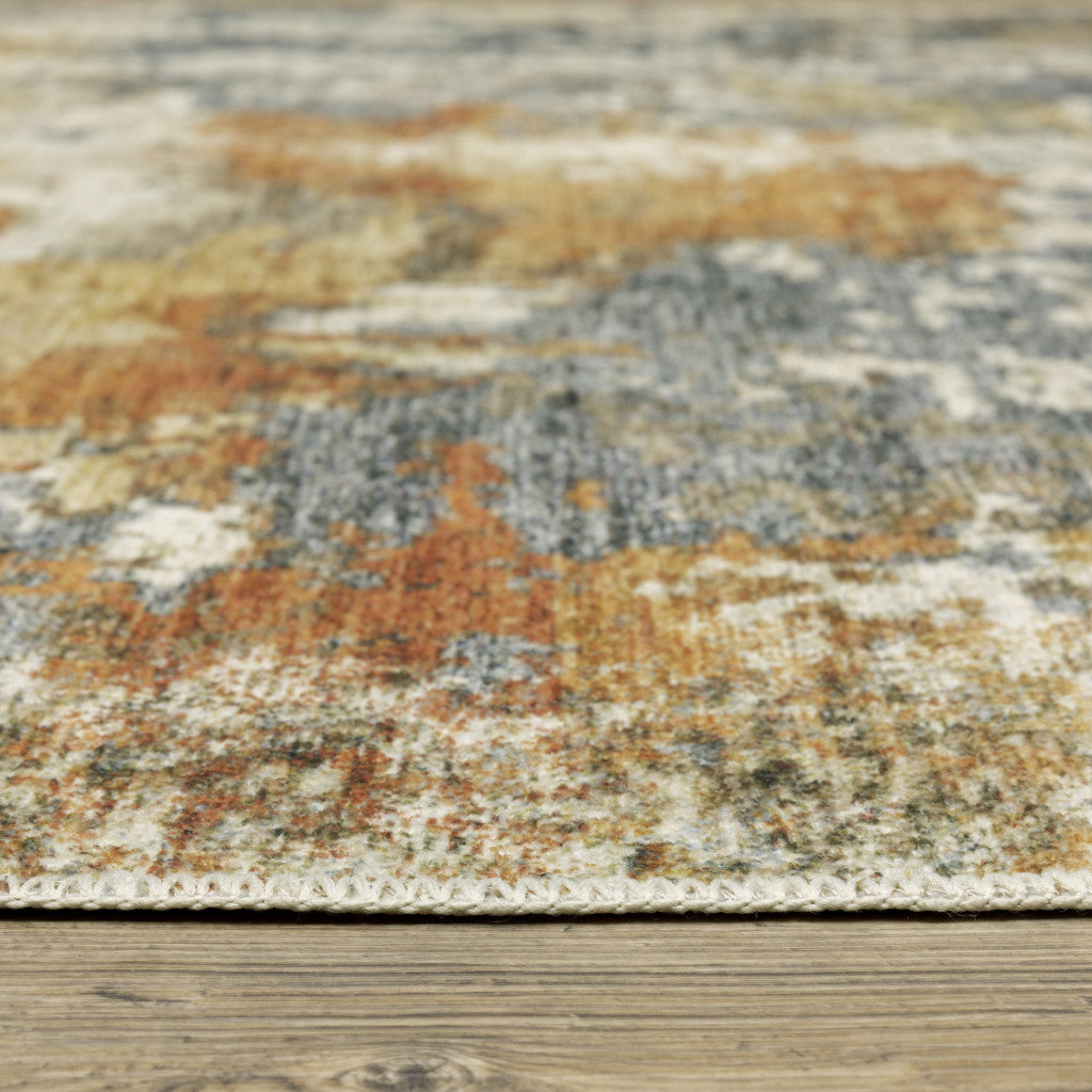 2' X 3' Teal Blue Orange Gold Grey Tan Brown And Beige Abstract Printed Stain Resistant Non Skid Area Rug