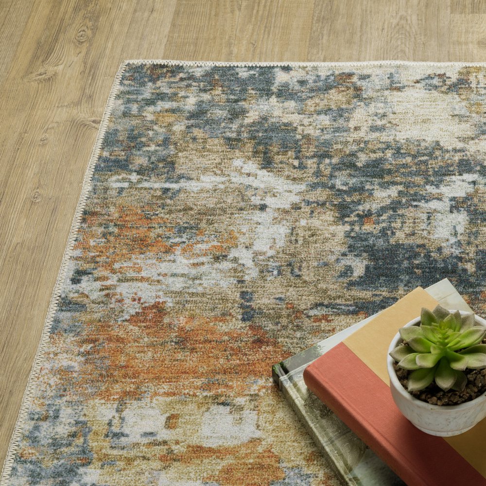 5' X 7' Teal Blue And Gold Abstract Distressed Area Rug