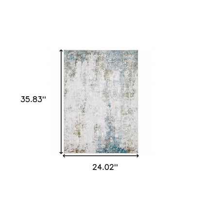 2' X 3' Ivory And Blue Abstract Printed Stain Resistant Non Skid Area Rug