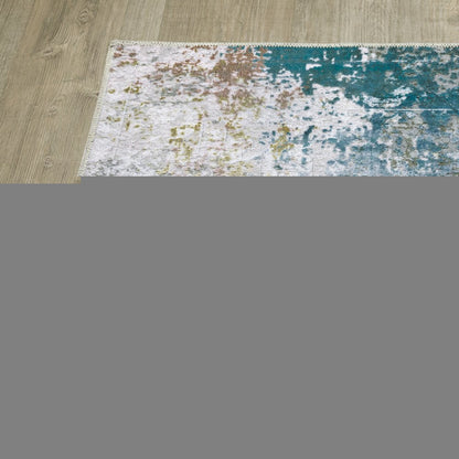2' X 3' Ivory And Blue Abstract Printed Stain Resistant Non Skid Area Rug
