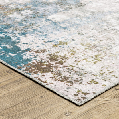 4' X 6' Ivory And Blue Abstract Printed Stain Resistant Non Skid Area Rug