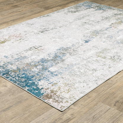 4' X 6' Ivory And Blue Abstract Printed Stain Resistant Non Skid Area Rug