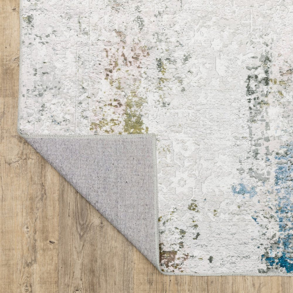 8' X 10' Ivory and Blue Abstract Non Skid Area Rug