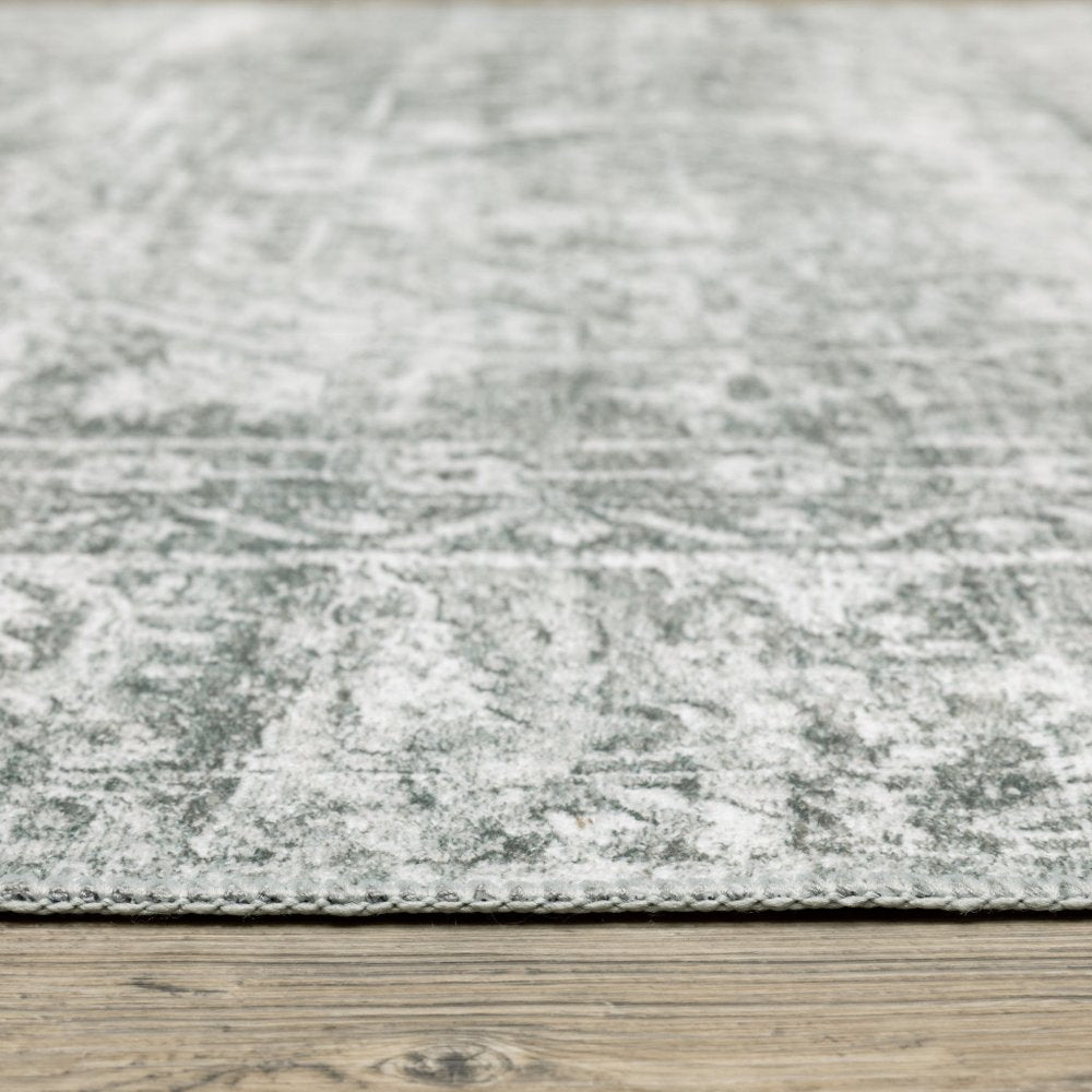 5' X 7' Sage Green Grey Ivory And Silver Oriental Printed Stain Resistant Non Skid Area Rug