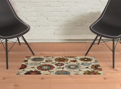 2' X 3' Ivory Blue Gold Green Orange Rust And Teal Floral Power Loom Stain Resistant Area Rug