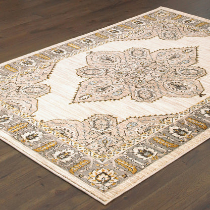 6' X 9' Ivory Gold Grey And Blue Oriental Power Loom Stain Resistant Area Rug