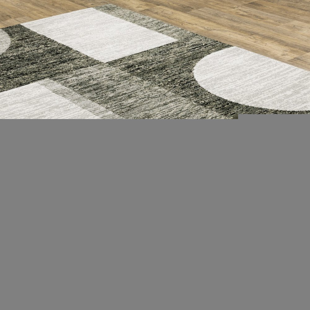 5' X 7' Gray and Ivory Geometric Power Loom Area Rug