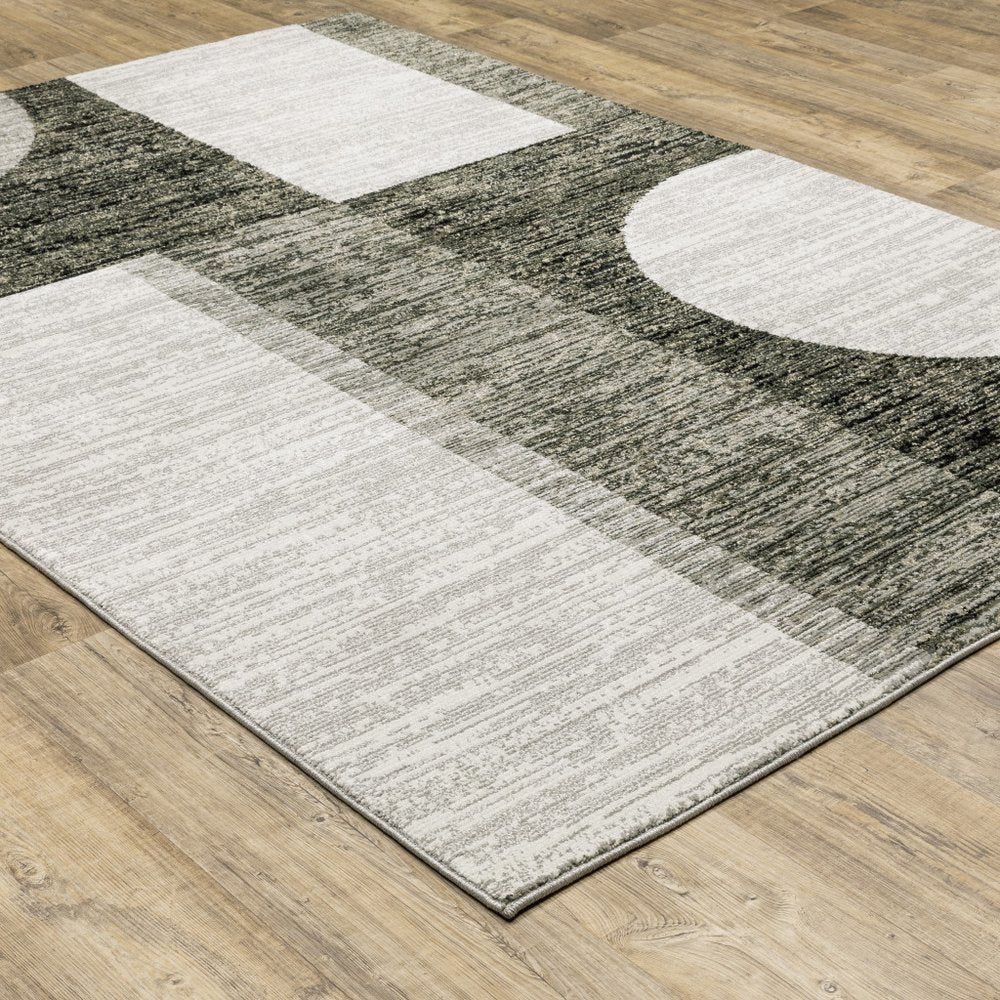 7' X 10' Gray and Ivory Geometric Power Loom Area Rug