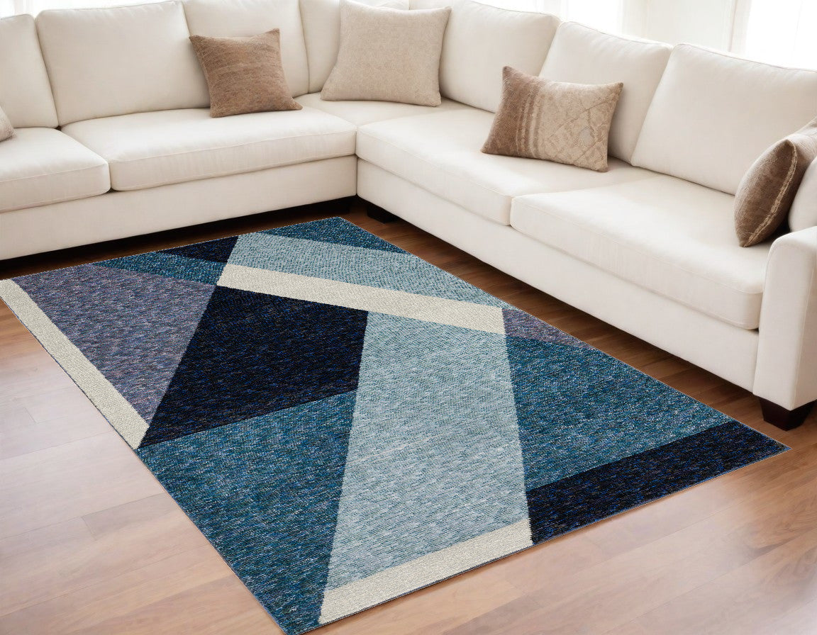 5' X 7' Blue Purple Grey and Teal Geometric Power Loom Area Rug