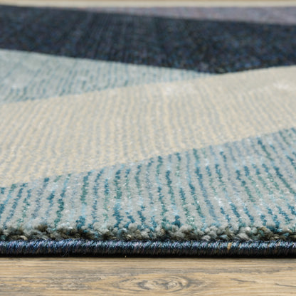 5' X 7' Blue Purple Grey and Teal Geometric Power Loom Area Rug