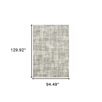 8' X 11' Grey And Ivory Abstract Shag Power Loom Stain Resistant Area Rug