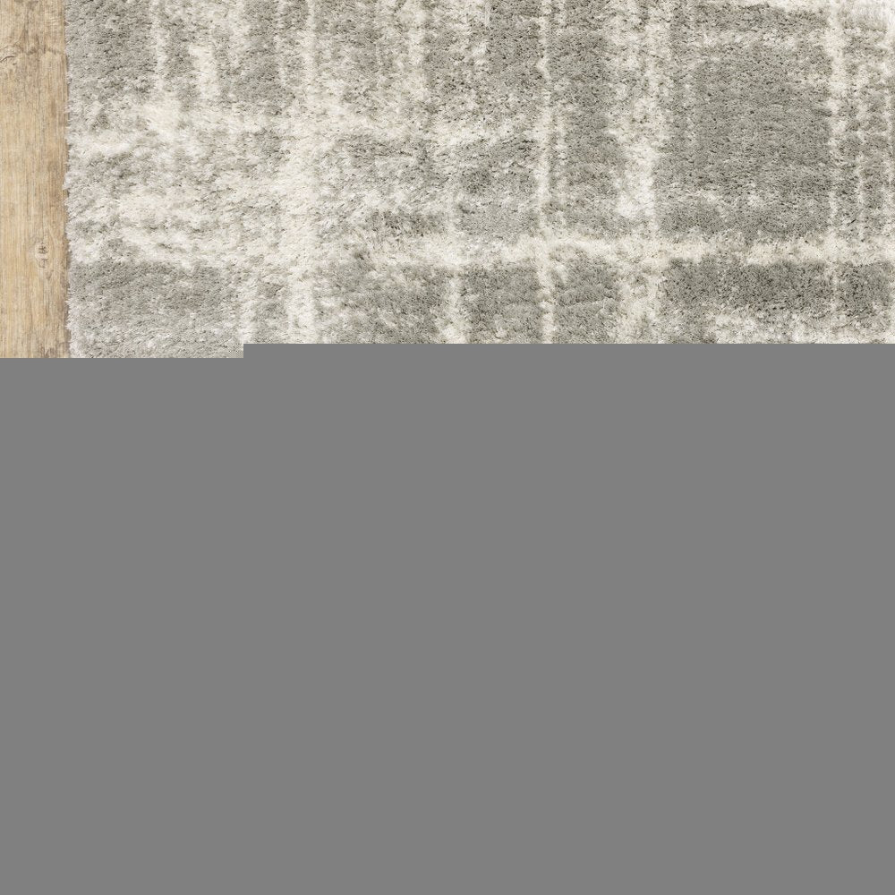 8' X 11' Gray and Ivory Abstract Shag Power Loom Area Rug