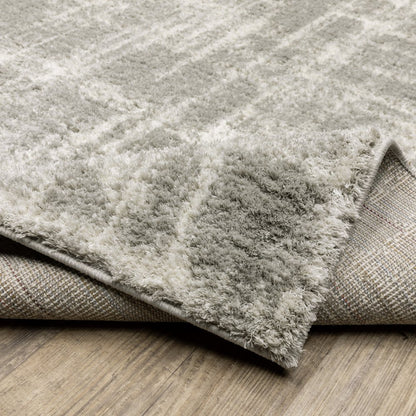 8' X 11' Gray and Ivory Abstract Shag Power Loom Area Rug