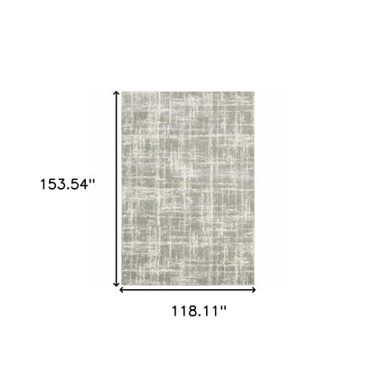 10' X 13' Grey And Ivory Abstract Shag Power Loom Stain Resistant Area Rug