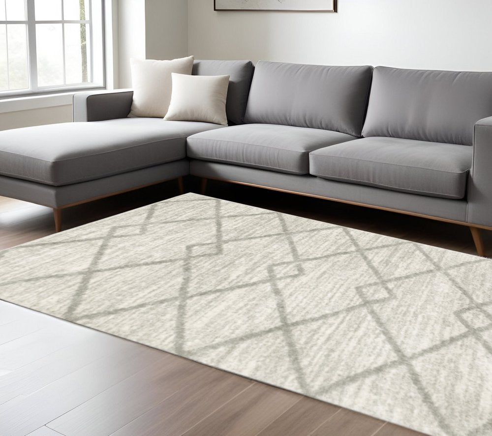 10' X 13' Ivory And Grey Geometric Shag Power Loom Stain Resistant Area Rug