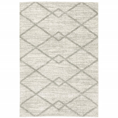 10' X 13' Ivory And Grey Geometric Shag Power Loom Stain Resistant Area Rug