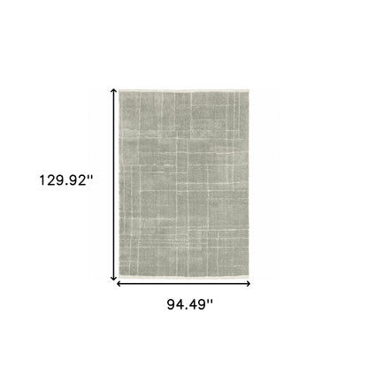 8' X 11' Grey And Ivory Geometric Shag Power Loom Stain Resistant Area Rug