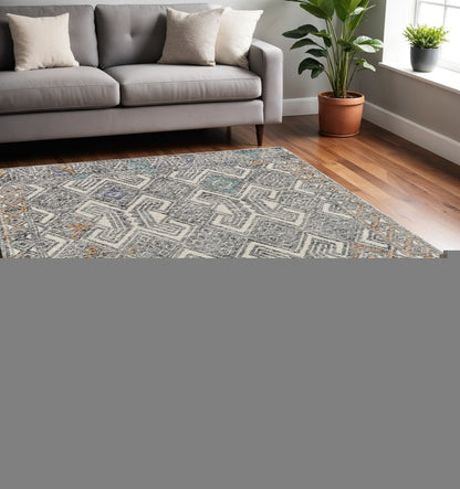 5' X 8' Black Ivory And Green Wool Geometric Tufted Handmade Distressed Area Rug