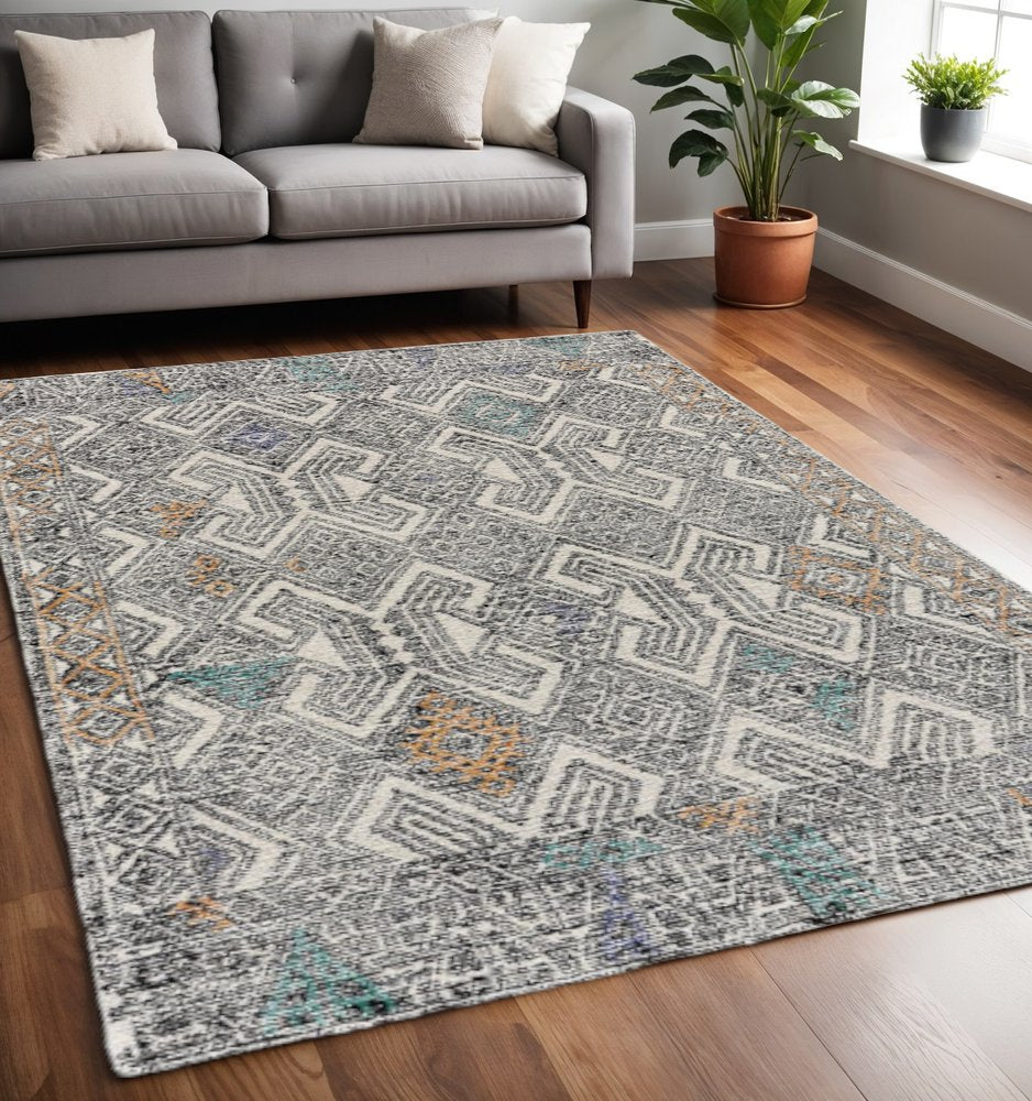 8' X 11' Black Ivory And Green Wool Geometric Hand Tufted Distressed Area Rug
