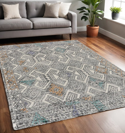 8' Black Ivory And Green Wool Geometric Hand Tufted Distressed Round Rug