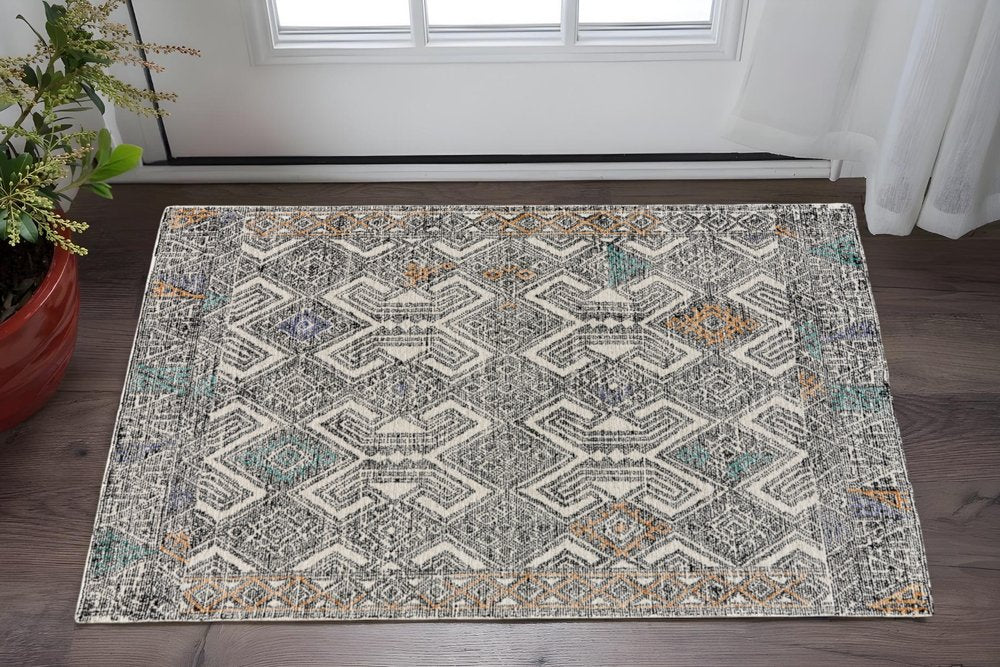 2' X 3' Black Ivory And Green Wool Geometric Hand Tufted Distressed Area Rug