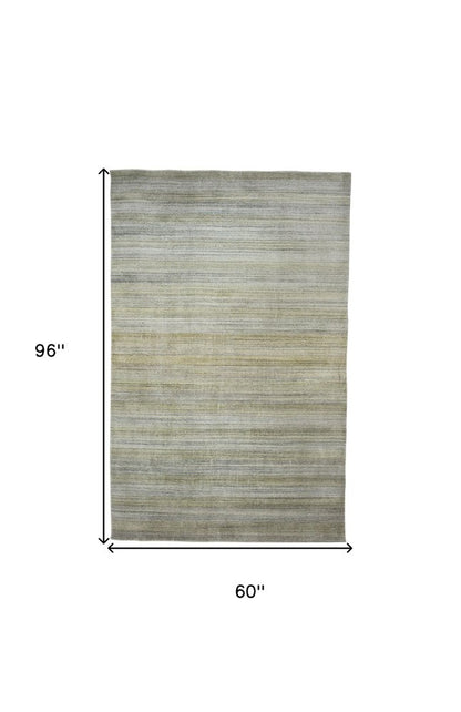 8' X 11' Gold Ivory And Gray Abstract Area Rug