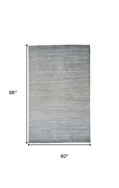 8' X 11' Blue and Gray Ombre Hand Woven Area Rug