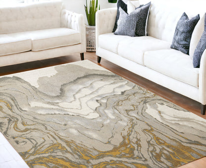 5' X 8' Gold Ivory And Gray Abstract Stain Resistant Area Rug