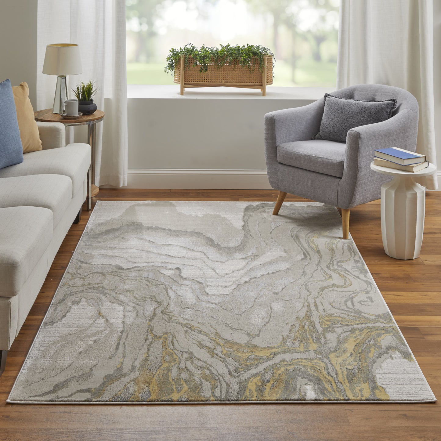 5' X 8' Gold Ivory And Gray Abstract Stain Resistant Area Rug