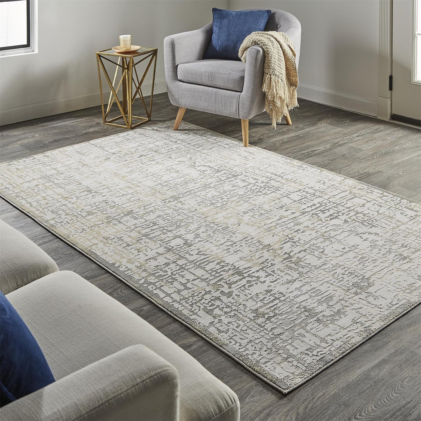 5' X 8' Gold Ivory And Gray Abstract Stain Resistant Area Rug