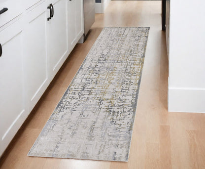 5' X 8' Gold Ivory And Gray Abstract Stain Resistant Area Rug