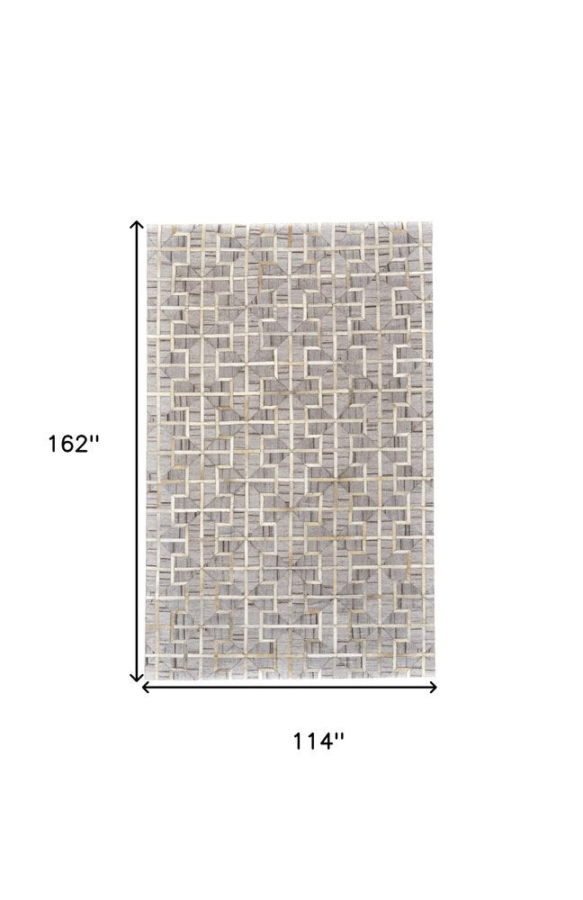 5' X 8' Tan and Brown Geometric Hand Woven Area Rug