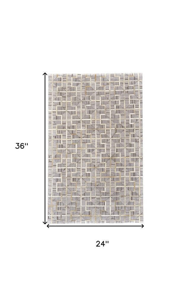 5' X 8' Tan and Brown Geometric Hand Woven Area Rug