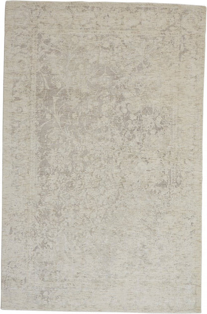 10' X 13' Ivory Blue And Tan Abstract Hand Woven Area Rug