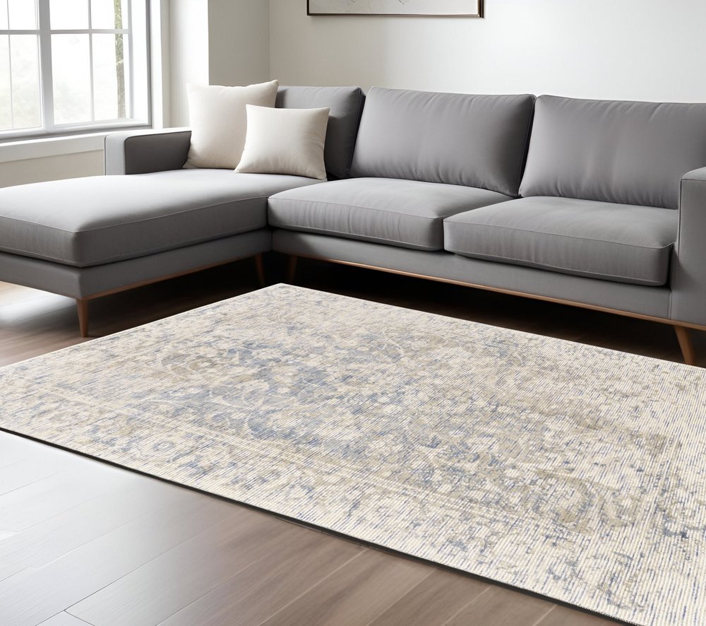 10' X 13' Ivory Blue And Tan Abstract Hand Woven Area Rug