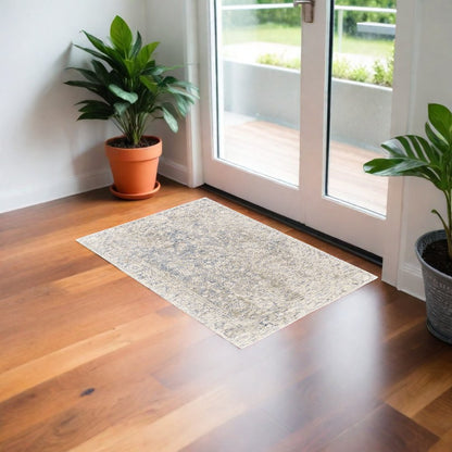 10' X 13' Ivory Blue And Tan Abstract Hand Woven Area Rug